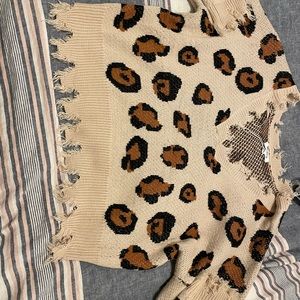 Miracle U.S.A. Leopard sweater, newly bought. Size large/ can fit a medium.